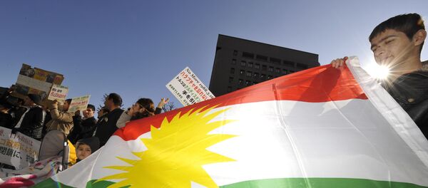 Турецкие курды с курдистанским флагом на демонстрации в Токио Турецкие курды с курдистанским флагом на демонстрации в Токио - اسپوتنیک ایران
