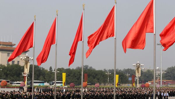 Торжественная церемония перед памятником народным героям на площади Тяньаньмэнь в Пекине, Китай - اسپوتنیک ایران  