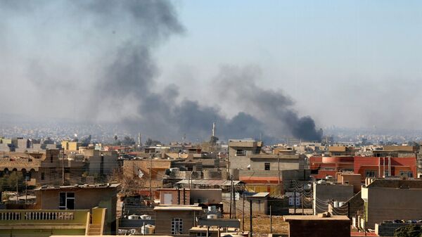 Дым над домами в иракском городе Мосул - اسپوتنیک ایران  