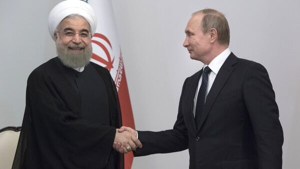 رئیس جمهور ایران دعوت پوتین برای سفر به مسکو را پذیرفت - اسپوتنیک ایران  