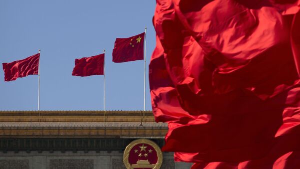 Китайские флаги над зданием Дома народных собраний в Пекине - اسپوتنیک ایران  