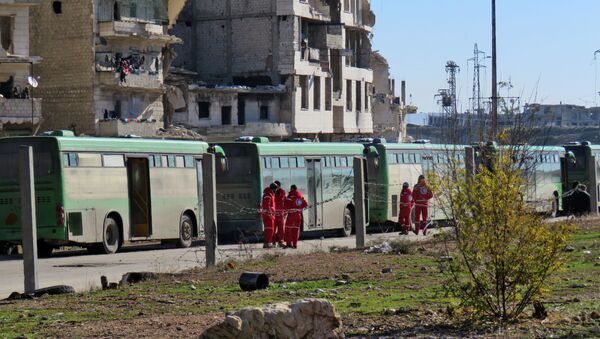 خروج اولین کاروان حامل عناصر مسلح سوری از حلب - اسپوتنیک ایران  