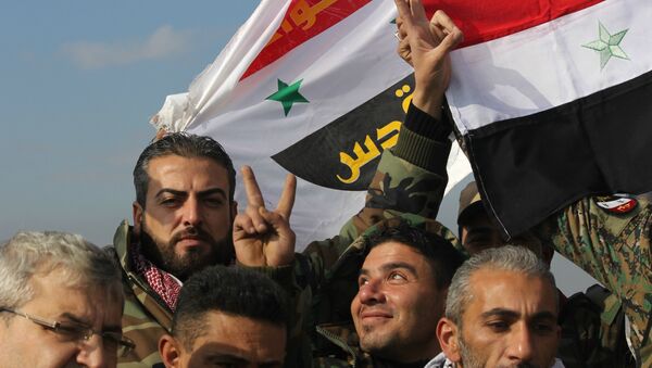 Syrian Arab Army celebrating victory in Sheikh Saeed, East Aleppo. - اسپوتنیک ایران  