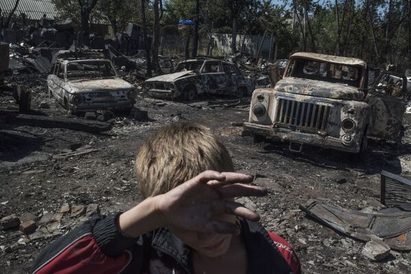 عواقب آتشباری قصبه « لازوویه» در دونتسک - اسپوتنیک ایران  
