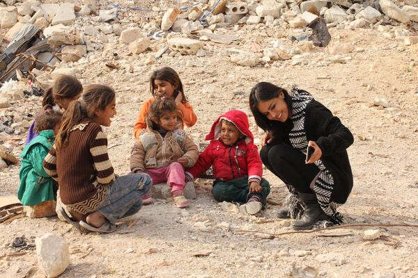 کارلا اورتیزبا بچه ها در سوریه - اسپوتنیک ایران  