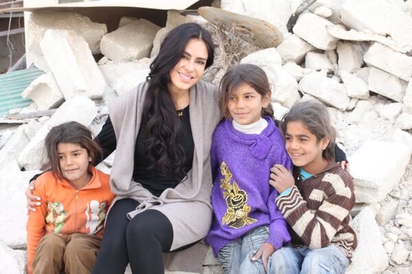 کارلا اورتیزبا بچه ها در سوریه - اسپوتنیک ایران  