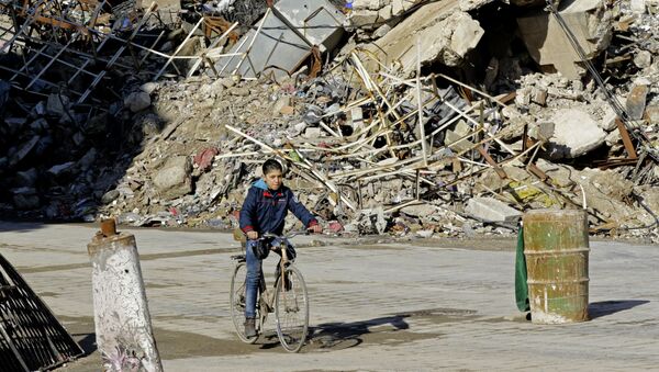 Мальчик катается на велосипеде в Алеппо - اسپوتنیک ایران  
