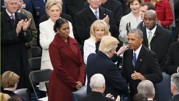 President Obama greets President-elect Donald Trump as former president Bill Clinton, his wife Hillary, and former President George W Bush and his wife Laura look on at the inauguration ceremonies swearing in Donald Trump as the 45th president of the United States on the West front of the U.S. Capitol in Washington, U.S., January 20, 2017 - اسپوتنیک ایران  