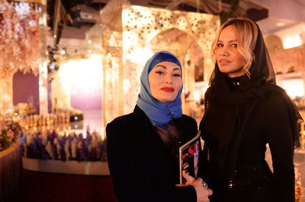 مهمانان در نمایش کلکسیون خانه مشهور مد  «فردوس»  عایشه قادروف در گروزنی - اسپوتنیک ایران  