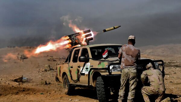 Стрельба из ракетной установки по бойцам ДАИШ в районе Мосула, Ирак - اسپوتنیک ایران  