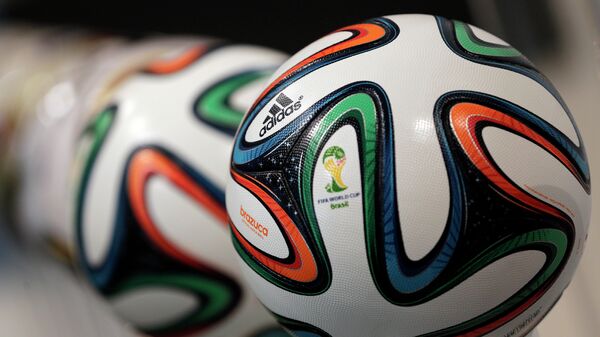 The adidas logo is printed on Brazuca, the official FIFA World Cup 2014 soccer ball - اسپوتنیک ایران  