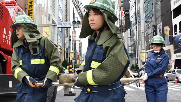 Японские пожарные во время работы - اسپوتنیک ایران  