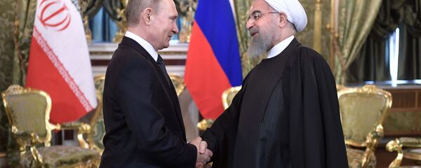 Президент России Владимир Путин и президент Исламской Республики Иран Хасан Рухани во время встречи в Москве - اسپوتنیک ایران  