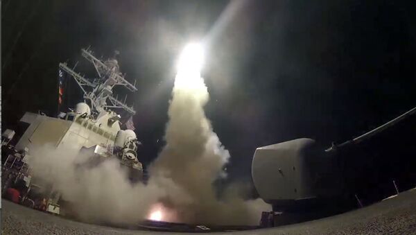 In this image from video provided by the U.S. Navy, the guided-missile destroyer USS Porter (DDG 78) launches a tomahawk land attack missile in the Mediterranean Sea, Friday, April 7, 2017. - اسپوتنیک ایران  