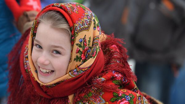 Девочка на празднике Широкая Масленица - 2016 в Казани - اسپوتنیک ایران  