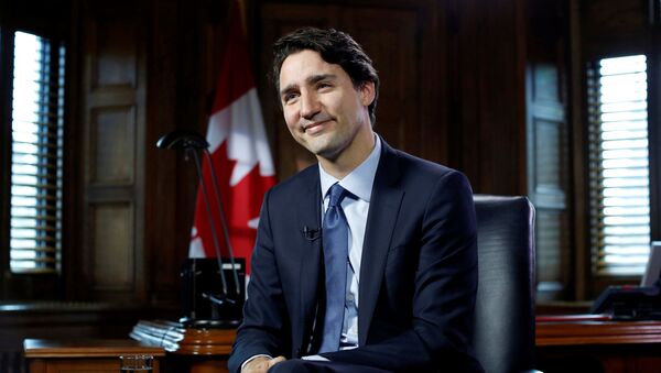 Премьер-министр Канады Джастин Трюдо во время интервью - اسپوتنیک ایران  