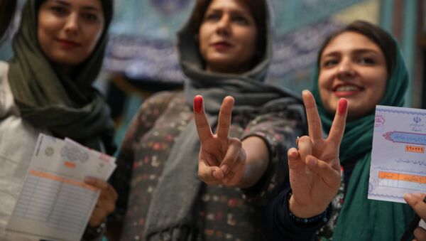 Иранские женщины, проголосовавшие на выборах президента - اسپوتنیک ایران  