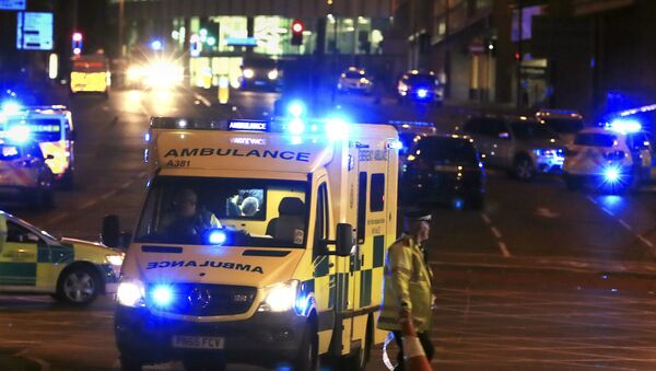 Emergency responders outside Manchester Arena after reports of an explosion at the venue during an Ariana Grandeconcert in Manchester, England, Monday, May 22, 2017. - اسپوتنیک ایران  