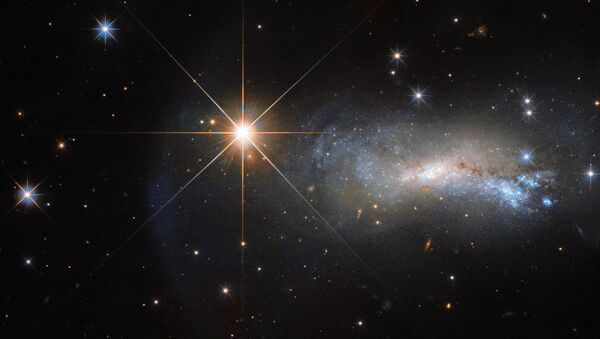 Яркая звезда TYC 3203-450-1, перекрывающая своим светом галактику NGC 7250 - اسپوتنیک ایران  