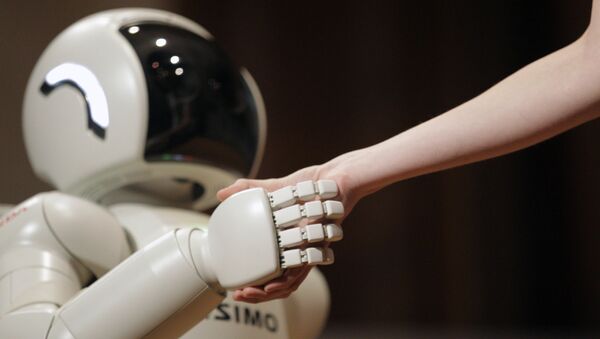 Робот ASIMO во время рукопожатия в Сербии - اسپوتنیک ایران  