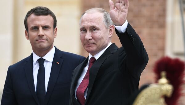 Президент Франции Эммануэль Макрон и президент России Владимир Путин на встрече в Версальском дворце - اسپوتنیک ایران  