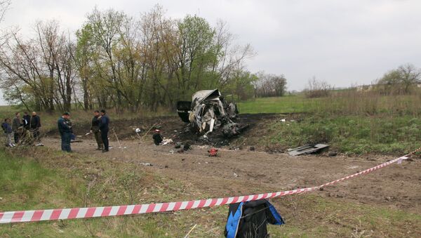 Место подрыва автомобиля сотрудников патруля Специальной мониторинговой миссии ОБСЕ на Украине - اسپوتنیک ایران  