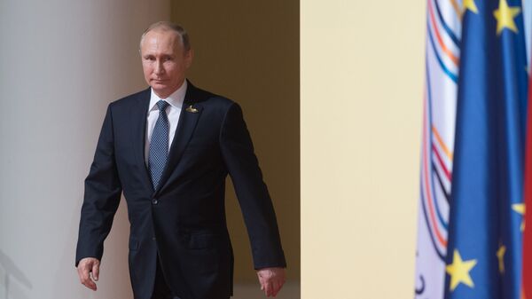 Президент РФ Владимир Путин перед началом церемонии совместного фотографирования глав делегаций государств-участников Группы двадцати G20 - اسپوتنیک ایران  