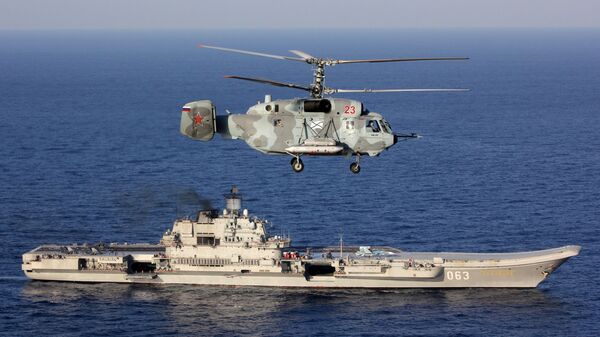 Тяжелый авианесущий крейсер Адмирал Кузнецов и вертолет Ка-29 Вооруженных сил РФ в Средиземном море - اسپوتنیک ایران  