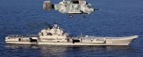Тяжелый авианесущий крейсер Адмирал Кузнецов и вертолет Ка-29 Вооруженных сил РФ в Средиземном море - اسپوتنیک ایران  