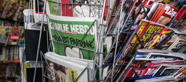 توهين مجدد شارلي ابدو به اسلام + کاریکاتور - اسپوتنیک ایران  