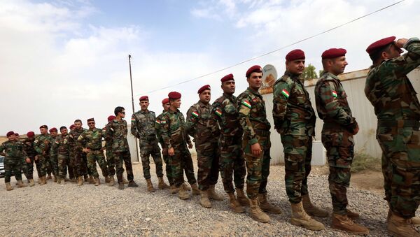 Курдские военные стоят в очереди, чтобы проголосовать на референдуме о независимости Иракского Курдистана - اسپوتنیک ایران  