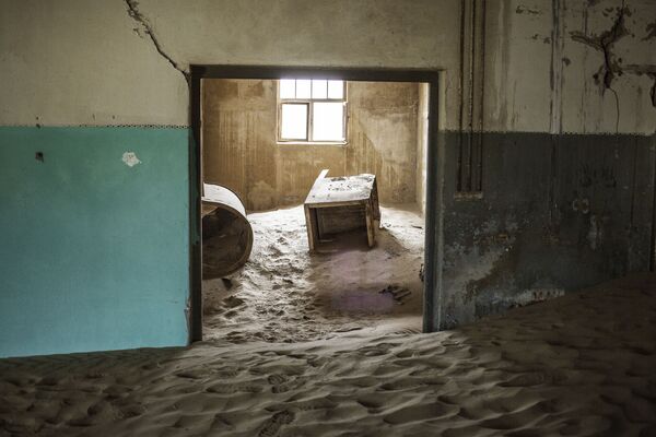 خانه مدفون شده در شن - شهر کولمانسکوپ در صحرای نامیبیا - اسپوتنیک ایران  