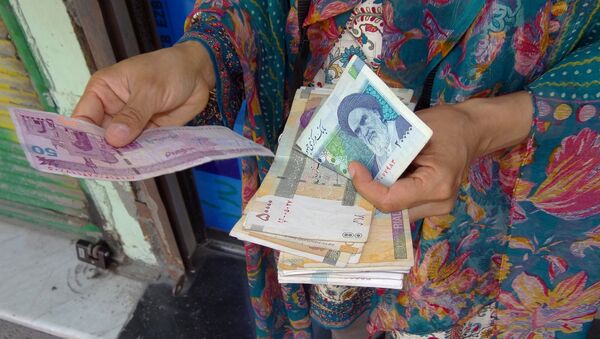مجمع تشخیص مصلحت نظام حدف 4 صفر از پول ملی ایران را بررسی کرد - اسپوتنیک ایران  