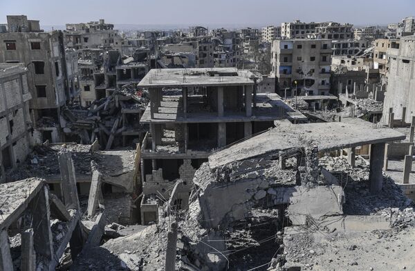 ساختمان های ویران شده  شهر رقه - سوریه - اسپوتنیک ایران  