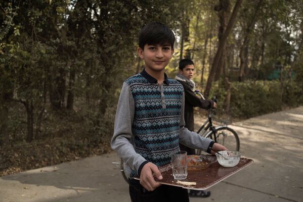 پسربچه ای در یکی از خیابان های کابل - اسپوتنیک ایران  
