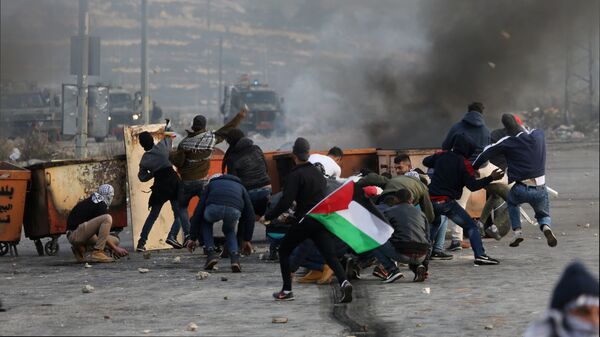 Участники акции протеста в Палестине против решения о признании Иерусалима столицей Израиля - اسپوتنیک ایران  