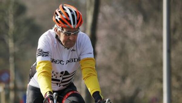 جون کری هنگام دوچرخه سواری - اسپوتنیک ایران  