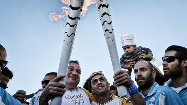 بازیگر ایرانی حامل مشعل المپیک +عکس،ویدئو - اسپوتنیک ایران  