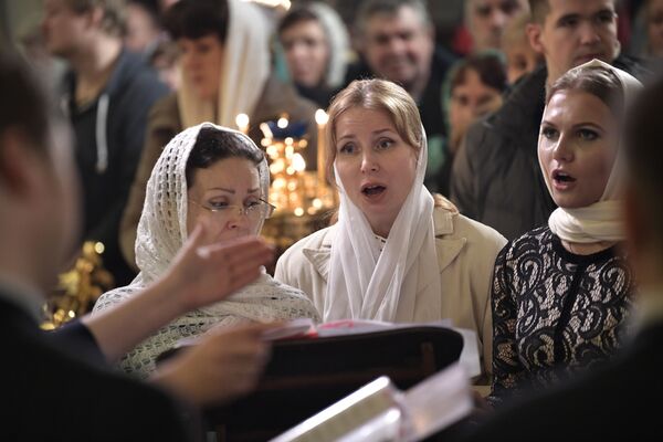 مراسم جشن حضرت مسیح در کلیسای سیمون بوگاپریمتس و آنا پروروچیتس مقدس در سن پترزبوگ - اسپوتنیک ایران  