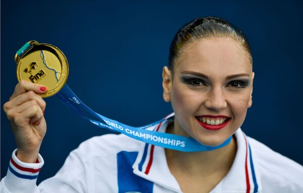 سوتلانا کولسنیچنکو برنده مدال طلا در شنای هماهنگ  قهرمانی جهان - اسپوتنیک ایران  