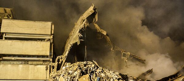 خرابه های ساختمان پلاسکو پس از آتش سوزی و فرو ریختن این ساختمان - اسپوتنیک ایران  