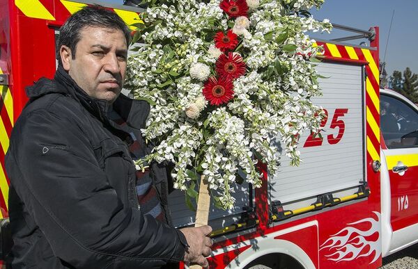 مراسم اولین سالگرد جان باختن آتش نشانان حادثه پلاسکو - بهشت زهرا، تهران - اسپوتنیک ایران  