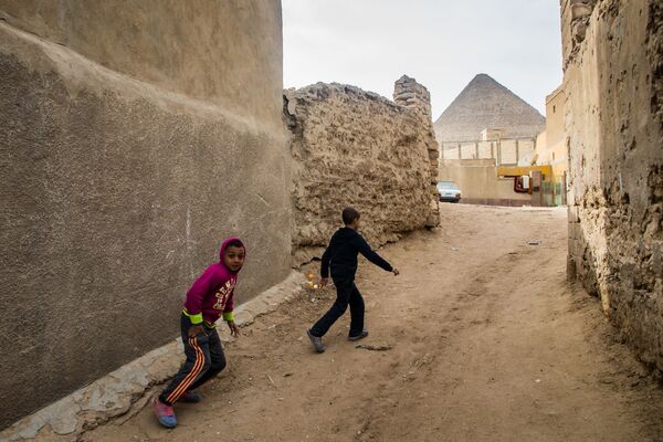 کودکان مشغول بازی در کوچه های قاهره - اسپوتنیک ایران  