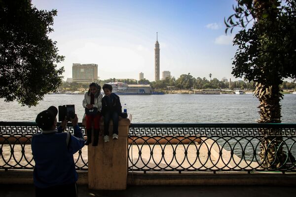 کودکان در ساحل قاهره عکس می گیرند - اسپوتنیک ایران  