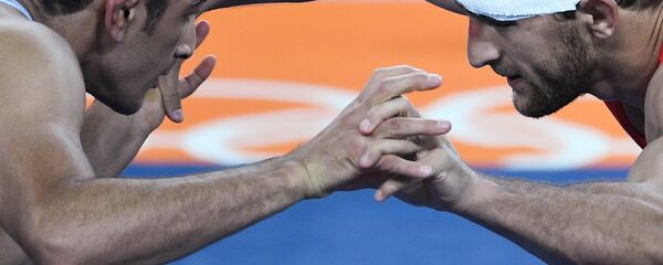 بگذارید کشتی گیر ایرانی با حفظ عزت تعلیق شود! بگذارید کشتی گیر ایرانی با حفظ عزت تعلیق شود! - اسپوتنیک ایران