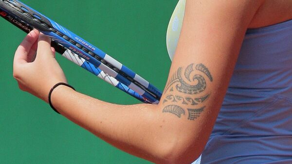 Close-up on Czech Karolina Pliskova arm's tatoo taken on May 18, 2011 at the Roland-Garros stadium in Paris during the Women's first qualifying round of the Grand Slam Roland-Garros tennis tournament. Tournament will run from May 22 to June 5, 2011 - اسپوتنیک ایران  