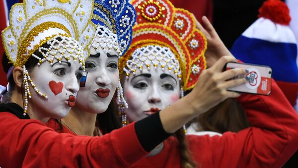 هواداران روسیه در بازی هوکی روسیه-آمریکا در 23-مین بازی های المپیک زمستانی - اسپوتنیک ایران  