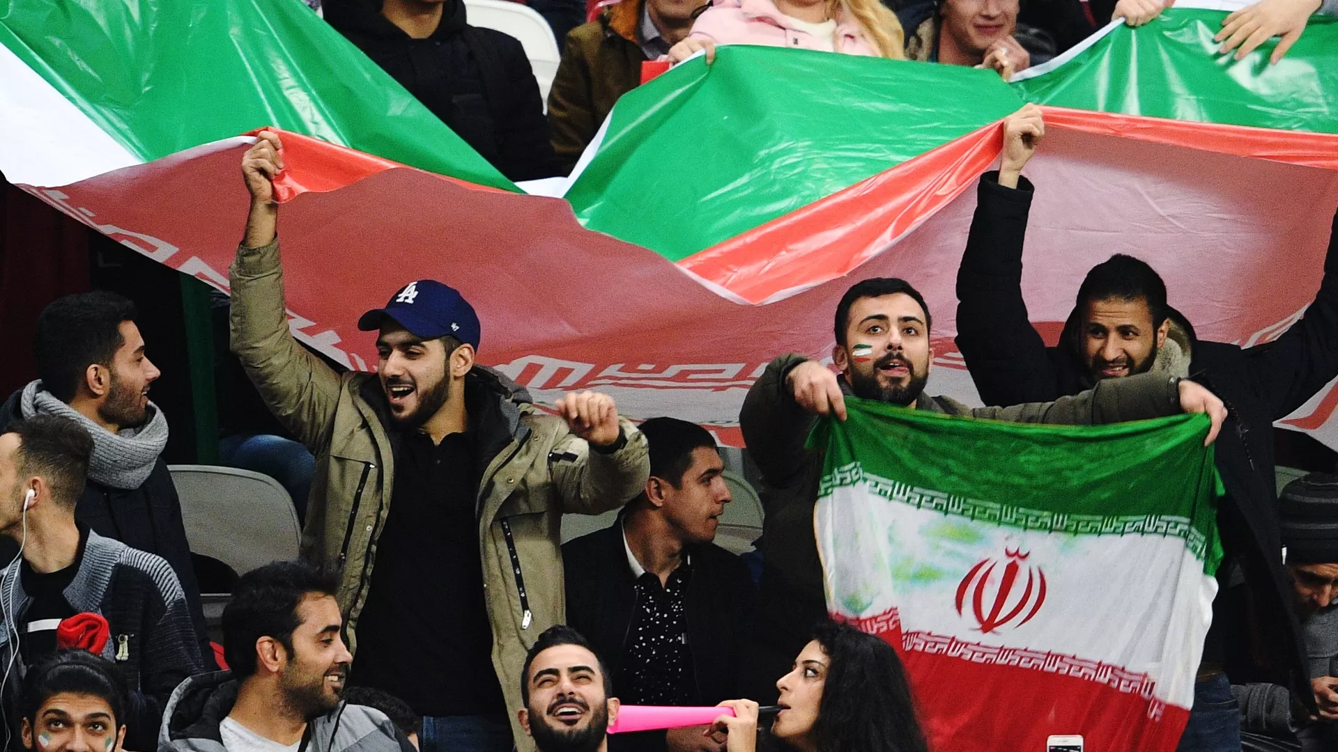 Iranian football fans during a friendly match between Russia and Iran