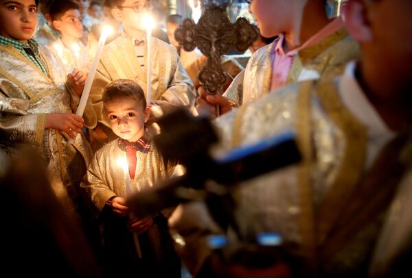 مسیحیان فلسطینی در مراسم عید پاک در نوار غزه - اسپوتنیک ایران  