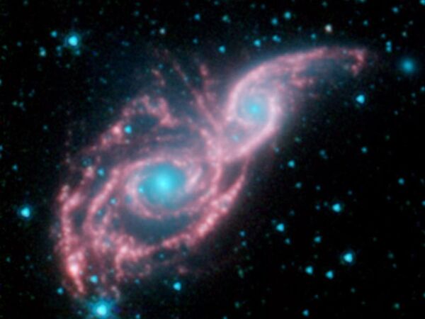 کهکشان های NGC 2207 و IC 2163 - اسپوتنیک ایران  